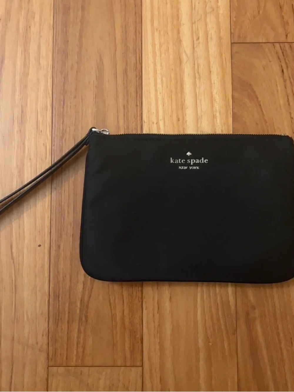 kate spade black wristlet pouch with silver logo